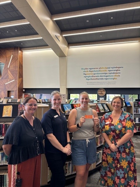 ​The winner, Tarsha, with the City of Karratha Librarians. 